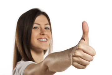 happy smiley woman in white t-shirt showing thumbs up