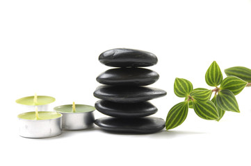 aromatherapy candles and massage pebbles