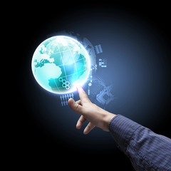 hand touching the earth