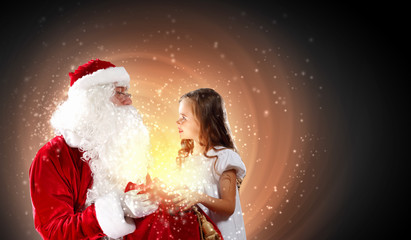 portrait of santa claus with a girl