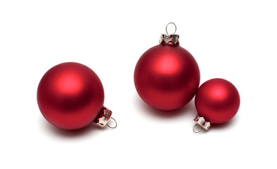 Red christmas balls on white background. - 47561359