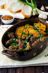 Meat baked with pumpkin and spices