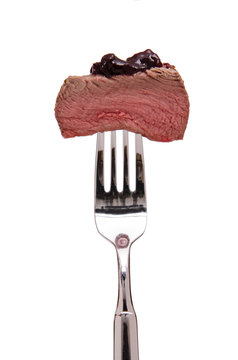 Filet vom Hirsch auf einer Gabel