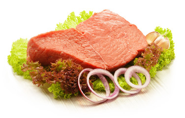 Composition with piece of beef meat and lettuce