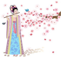 Schönes orientalisches Mädchen in der Nähe von Kirschblüten