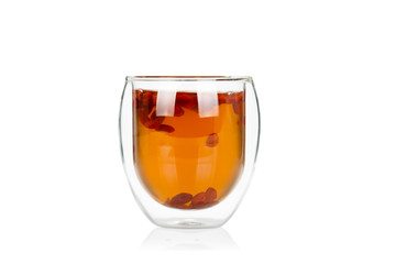 Cup of delicious hot goji berry potion on white