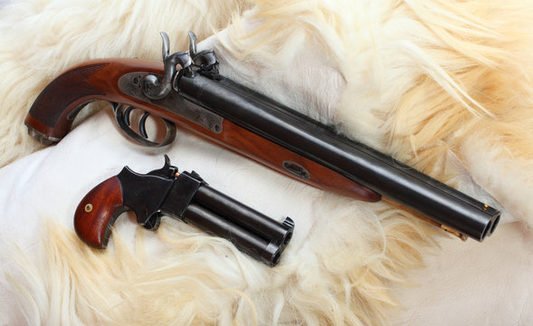 Vintage large-bore pistols. British colonial weapons.