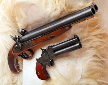 Vintage large-bore pistols. British colonial weapons.