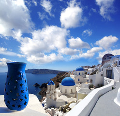 Santorini with  old architecture, churches against sea in Greece - obrazy, fototapety, plakaty