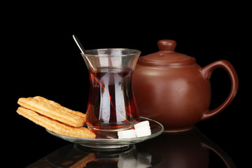 glass of Turkish tea isolated on black