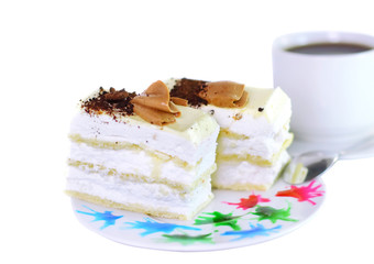 Sponge cake and  cup of coffee. Isolated