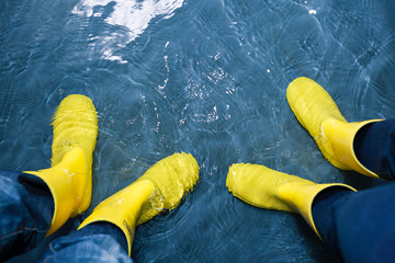 rubber boots in the water