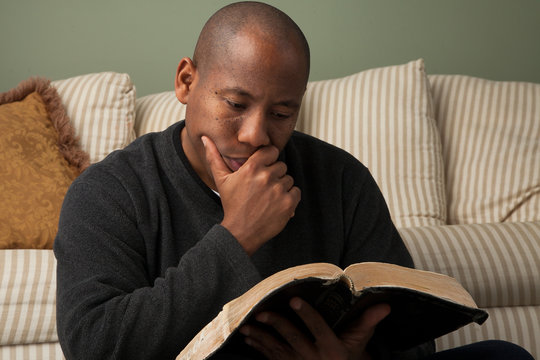 African American Studying the Bible at Home