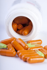 Capsules with a bottle