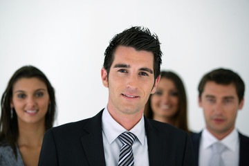 young businessman leading a team