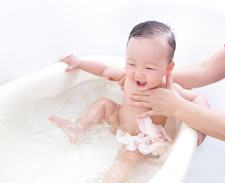 excite baby happy taking bath