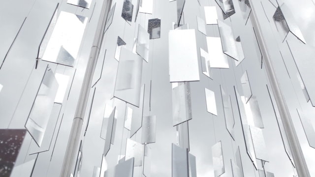 City reflects in mirrors.