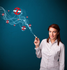 Young woman smoking dangerous cigarette with no smoking signs