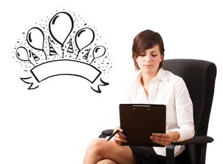 Young girl presenting a party label on whiteboard