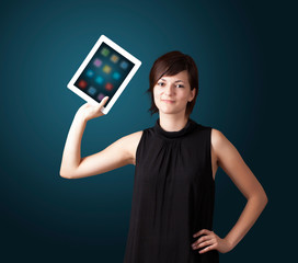 woman holding modern tablet with colorful icons