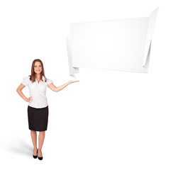 young woman presenting abstract origami copy space