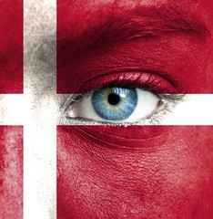 Human face painted with flag of Denmark