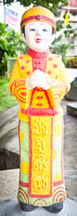 Chinese boyl statue with greeting action