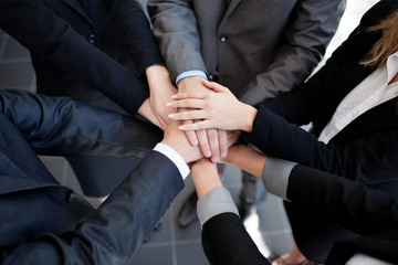 Business team joining hands