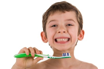 Boy holding a toothbrush