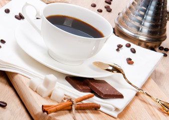 Coffee cup with coffee beans