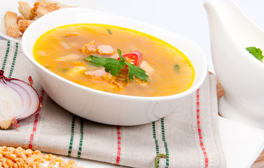 Peas soup in a white porcelain plate