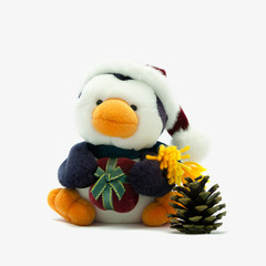 Penguin with Santa hat,present and pine cone.