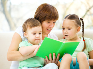 Family is reading book