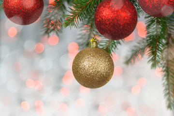 Christmas card with balls and spruce twig