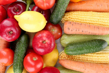 Assortment of fresh vegetables and fruits as a background
