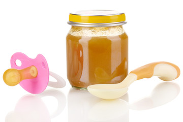 Useful and tasty baby food with beige small spoon isolated