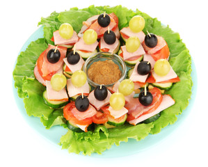 Canapes on plate isolated on white