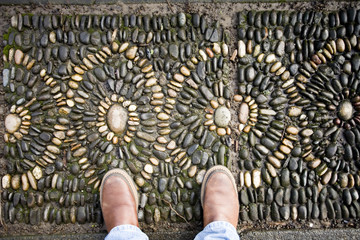 Stone Mosaic with Two Feet