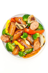 Grilled sausages and vegetables