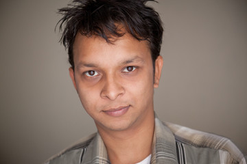 Obraz premium Closeup of handsome indian young man