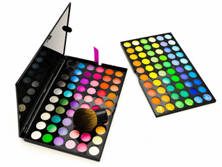 multicolored eye shadows and cosmetics brush