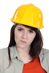 Confused construction worker