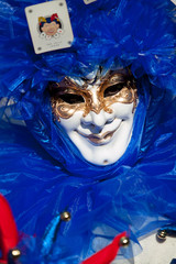 Mask in San Marco square during carnival of Venice