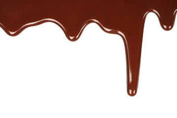 Melted chocolate dripping on white background .