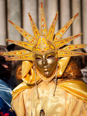 Mask in San Marco square during carnival of Venice