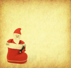 Christmas greeting card with Santa Claus and boot