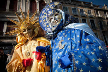 Masks in San Marco square during carnival of Venice