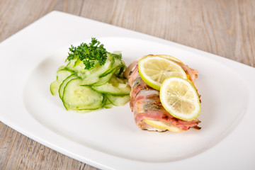 Fresh grilled salmon wrapped with bacon