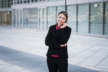 smiling business girl on the phone