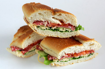 Fresh sandwiches with cheese, salami and lettuce